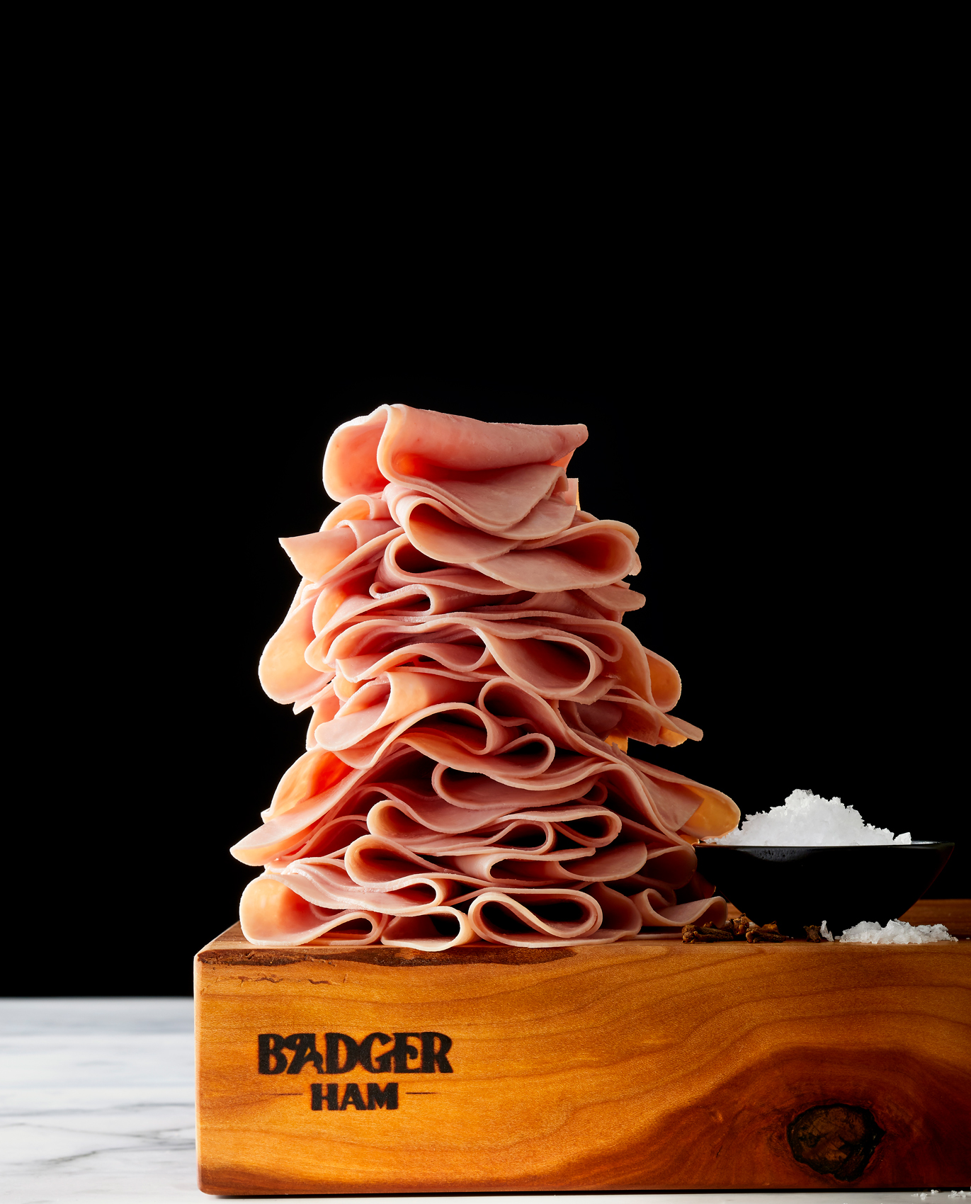 Badger Ham, stack of sliced ham photo by Chris Kessler Photography.  Chris Kessler is a freelance Photographer based in Milwaukee Wisconsin. Specializing in Food photography and portraiture.