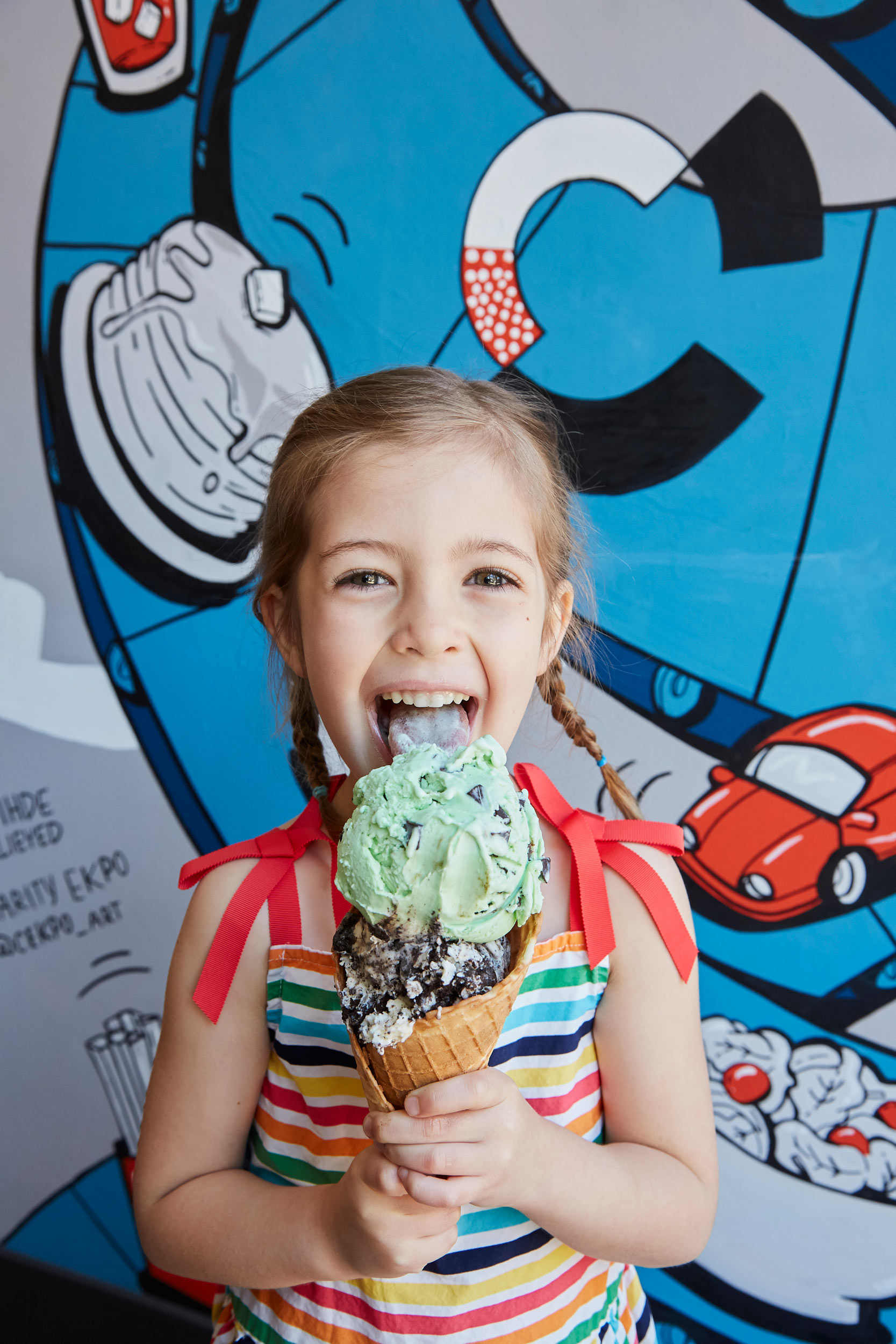 Girl with Double Scoop Ice Cream Cone photo by Chris Kessler Photography.  Chris Kessler is a freelance Photographer based in Milwaukee Wisconsin. Specializing in Food photography and portraiture.