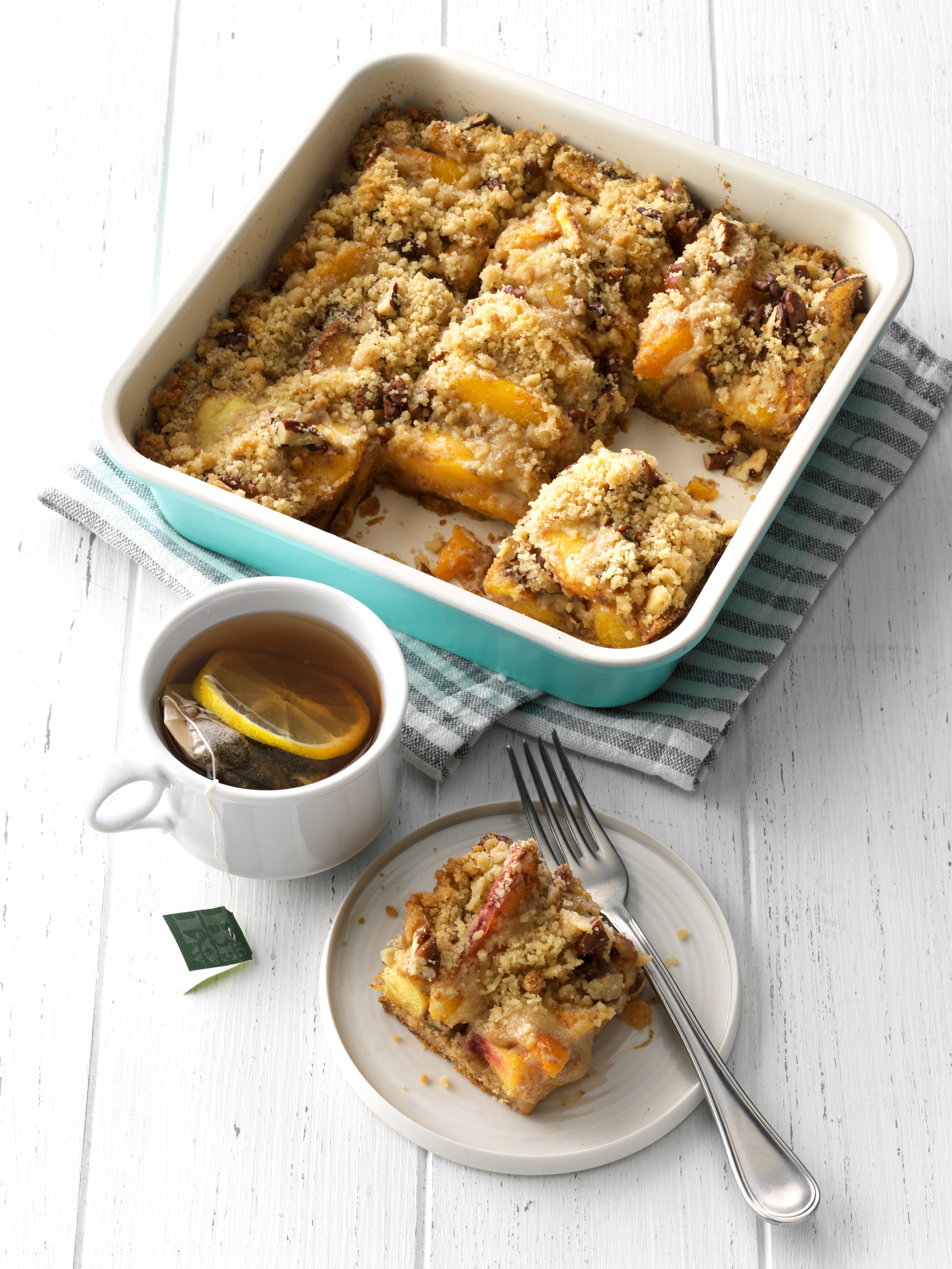 Peach Crumble Bars photo by Chris Kessler Photography.  Chris Kessler is a freelance Photographer based in Milwaukee Wisconsin. Specializing in Food photography and portraiture.
